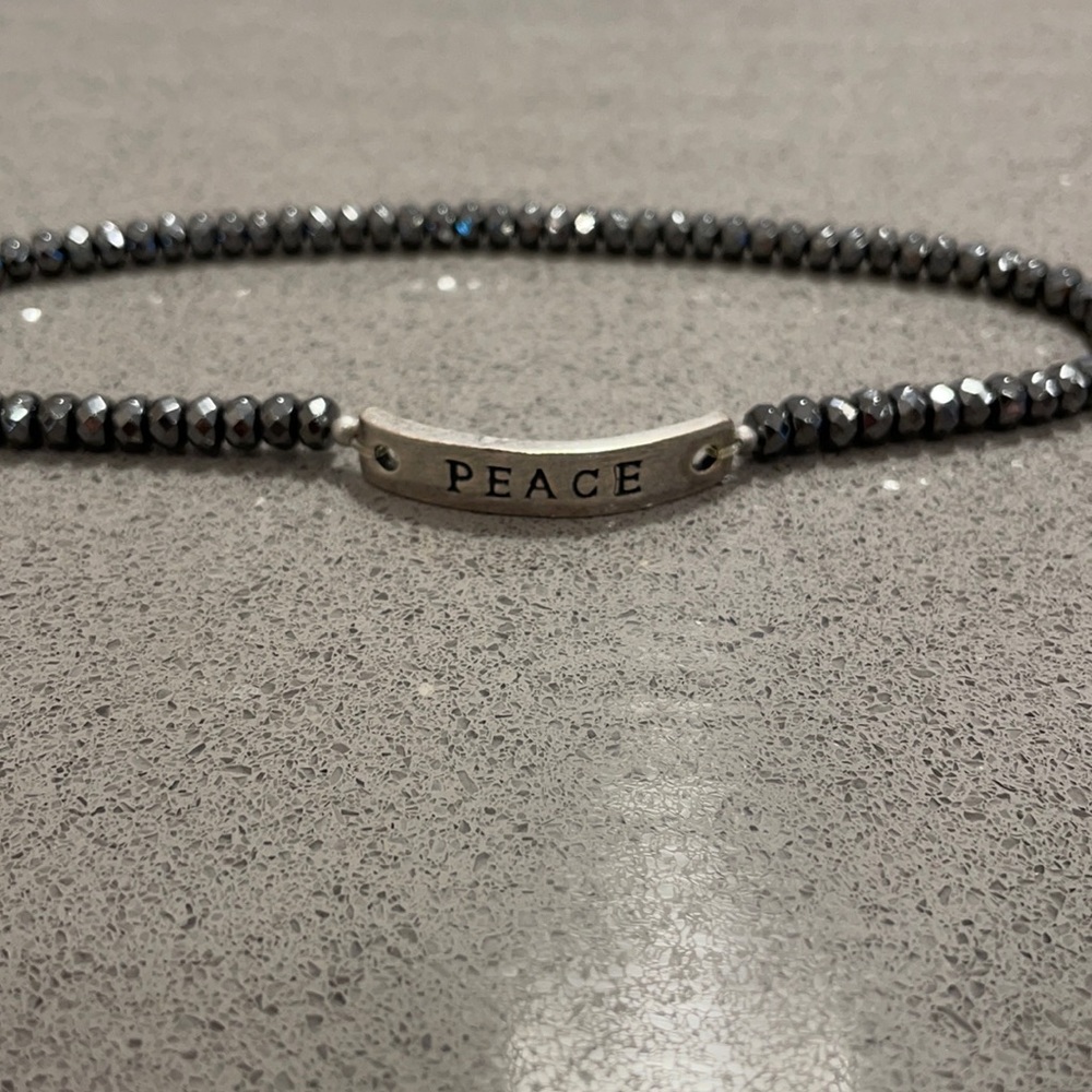 Silver and pewter beaded “Peace” bracelet